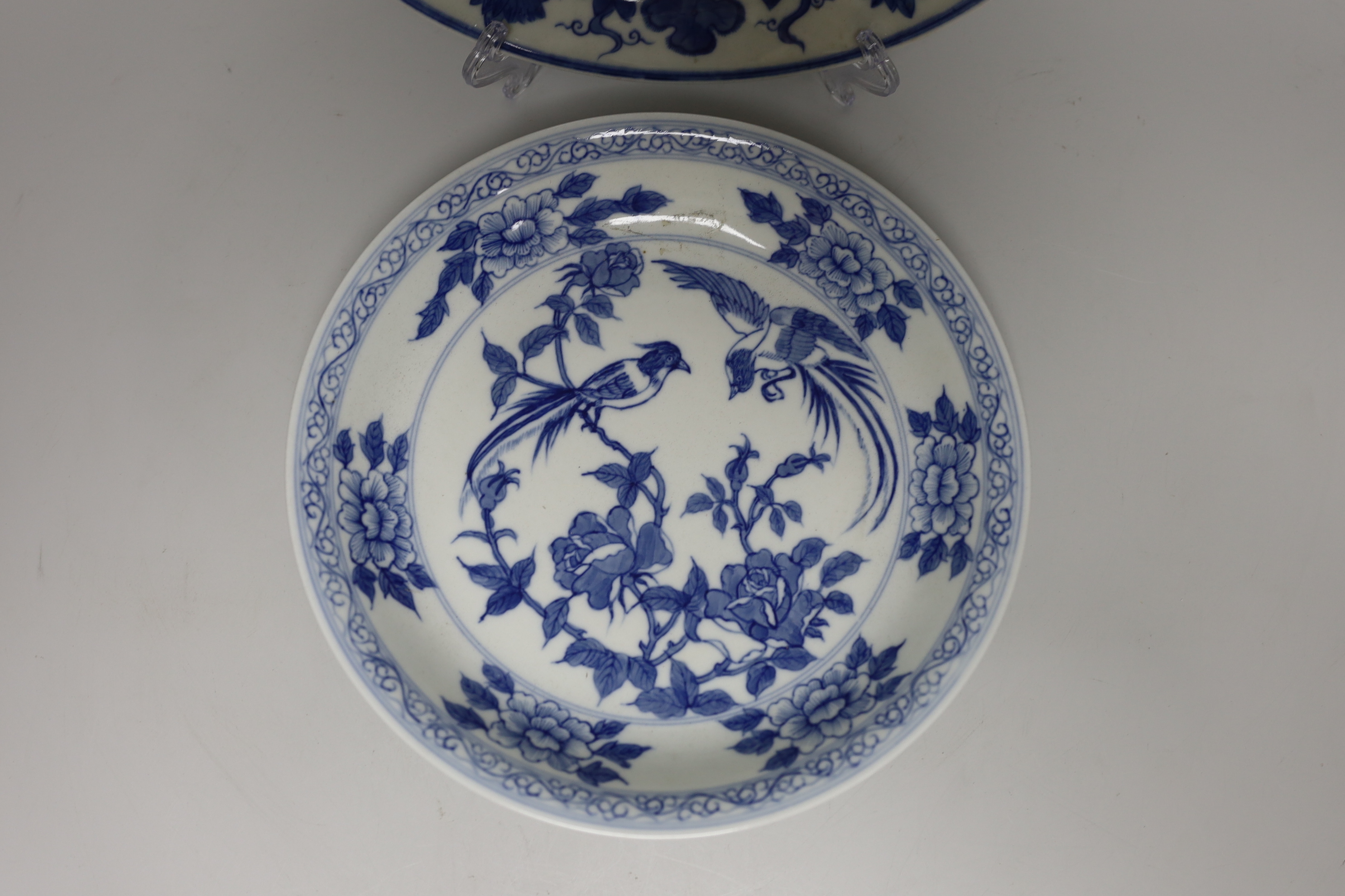 Two Chinese underglaze blue dishes, largest 21cm diameter